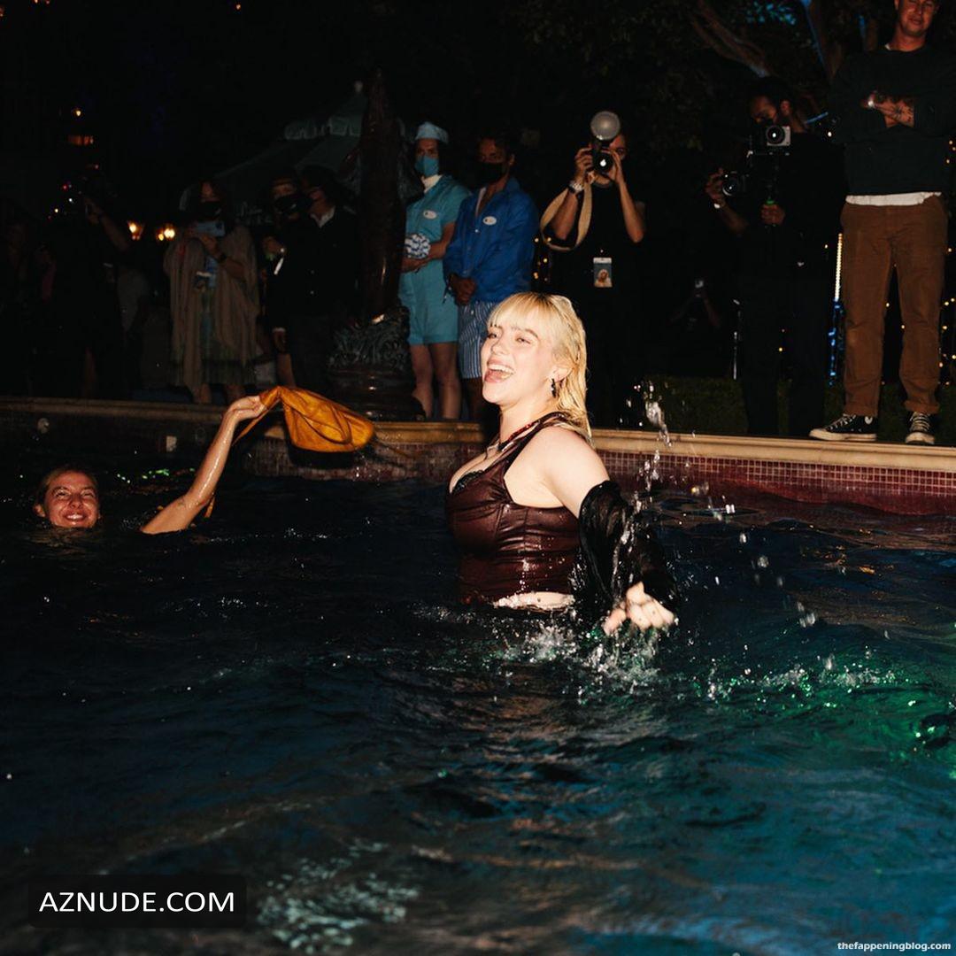 Billie Eilish Sexy Shows Off Her Cleavage In The Pool Aznude
