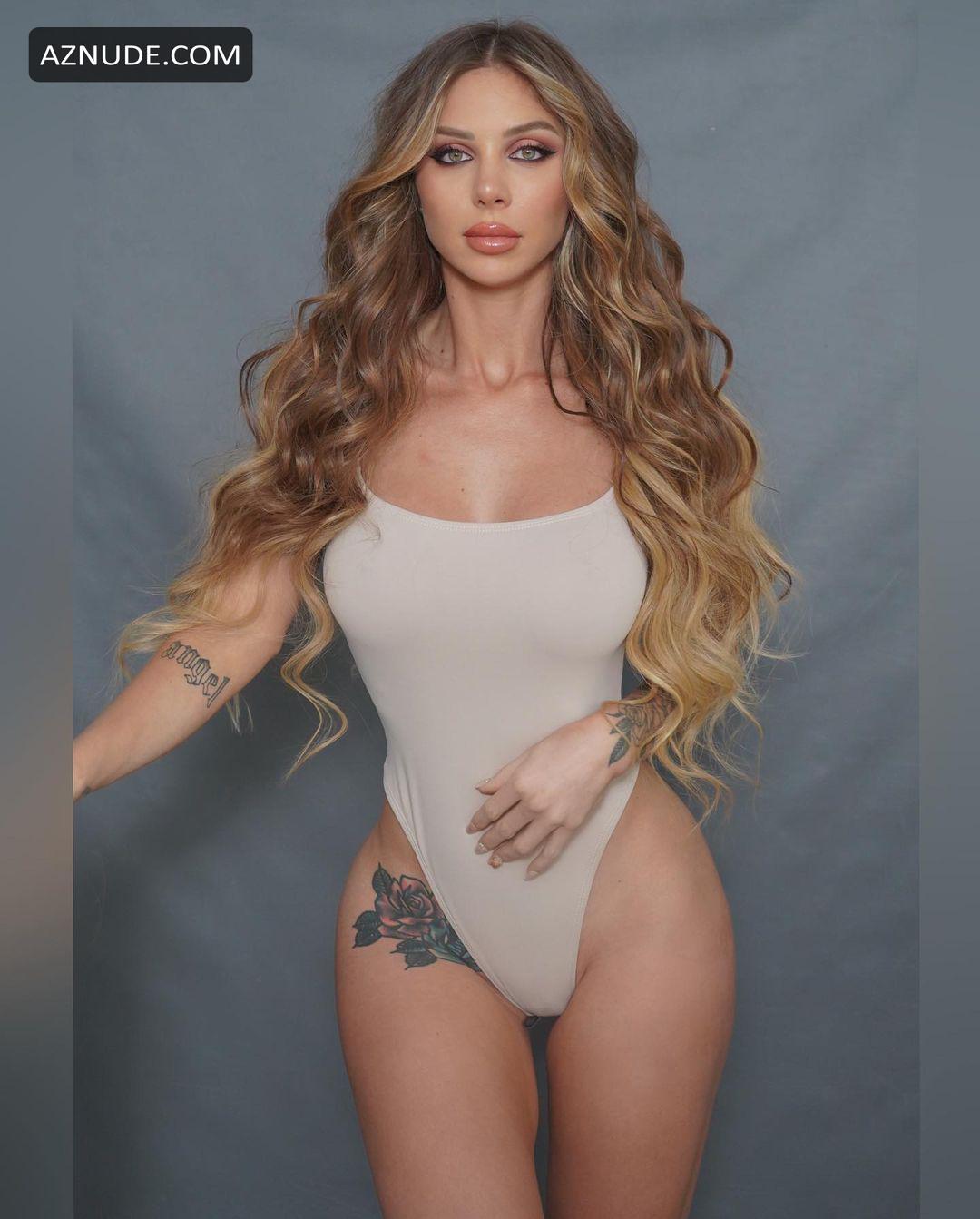 Romina Malaspina Sexy Hot White Bodysuit Photoshoot Showcasing Her Stunning Body Aznude