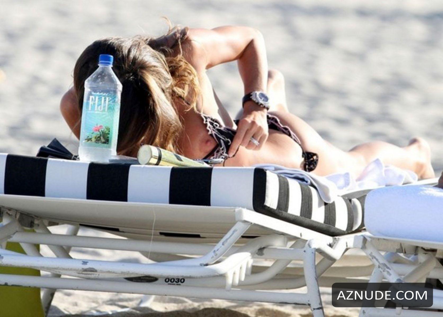  toplessbeachcelebs: Claudia Galanti (Italian Model) boobs  slipping out of bikini in Miami (June 2012)