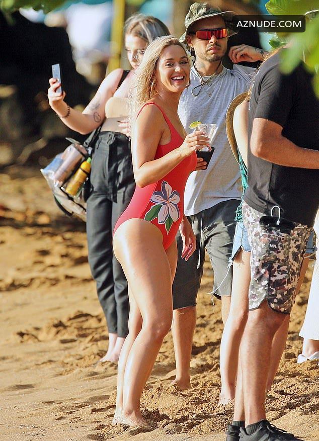 Katy Perry Pictured In A Red Swimsuit While Shooting A New