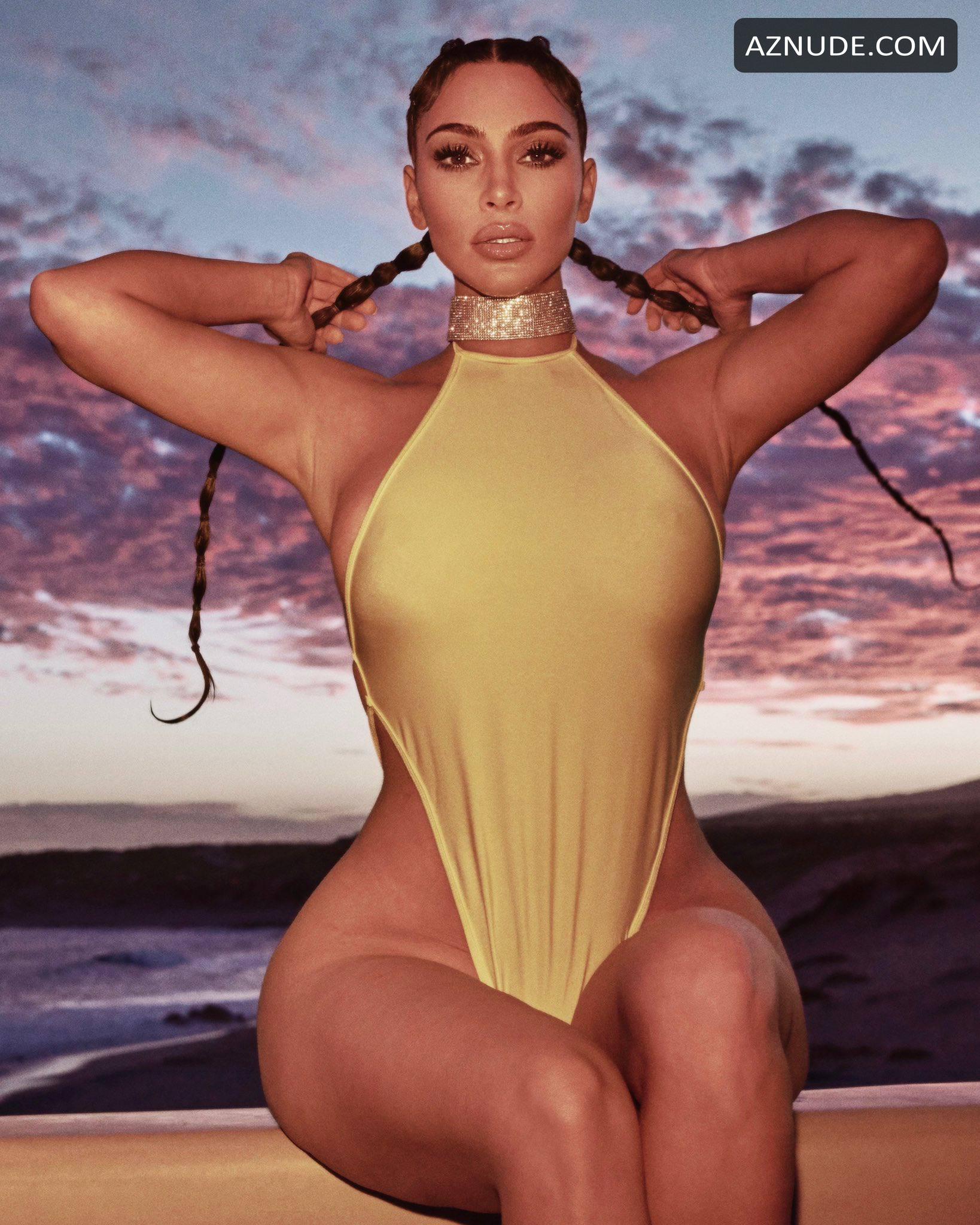 Kim Kardashian West Shows Off Her Boobs And Wide Hips Posing In A Revealing Yellow Swimsuit In A