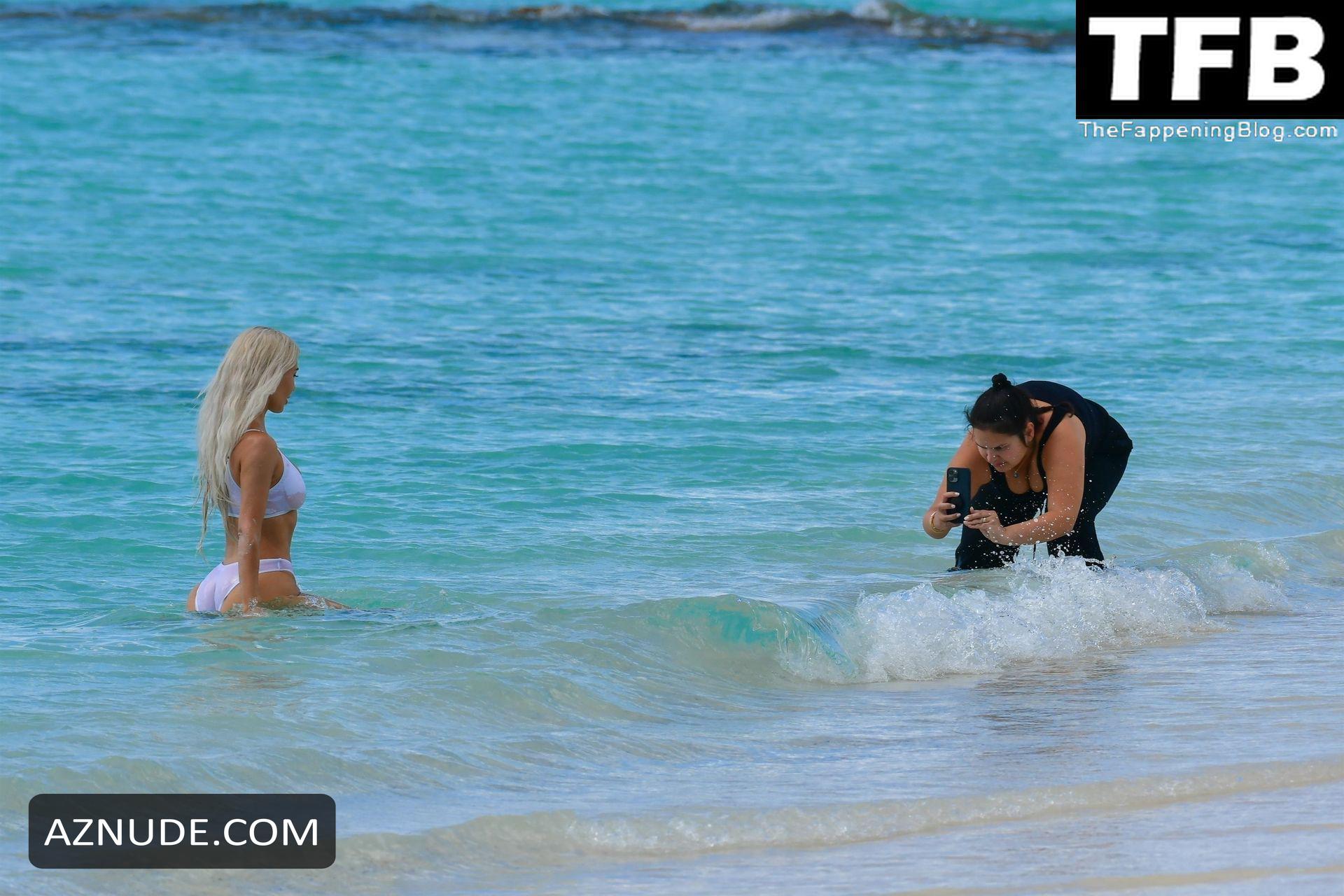 Kim Kardashian Sexy Seen Showing Off Her Hot Figure In A White Bikini At The Beach In Turks And