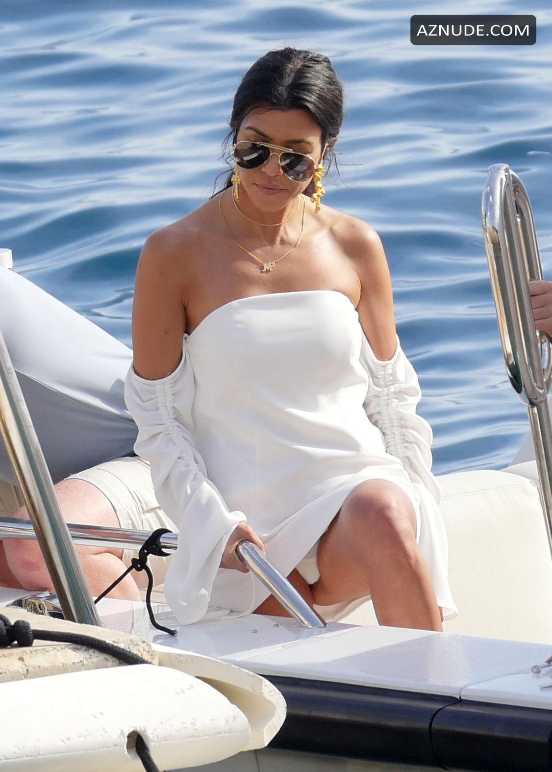 Kourtney Kardashian's Sexy Legs And Upskirt