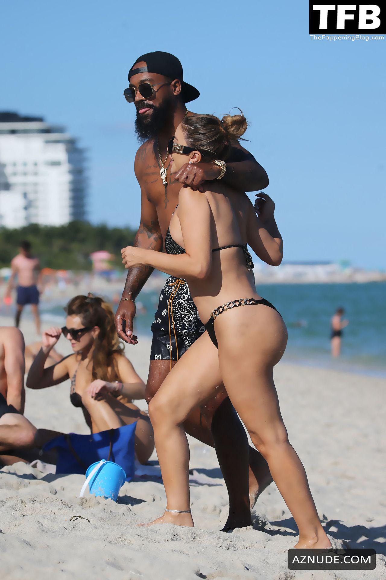 Larsa Pippen Sexy Shows Off Her Hot Curves in a Black Bikini With Marcus  Jordan on the Beach in Miami - AZNude