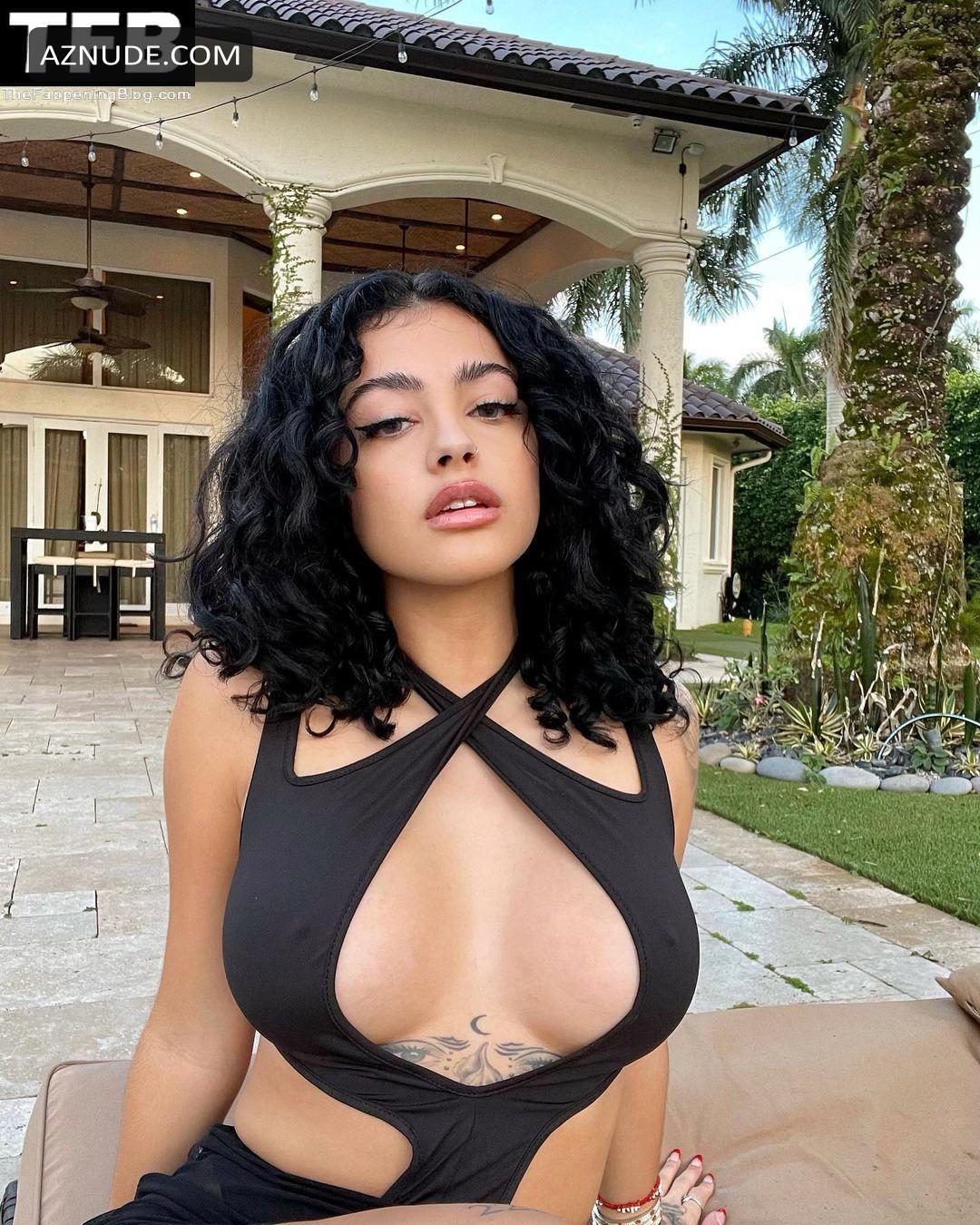 Malu Trevejo Sexy Poses Showing Off Her Hot Tits In A Black One Piece