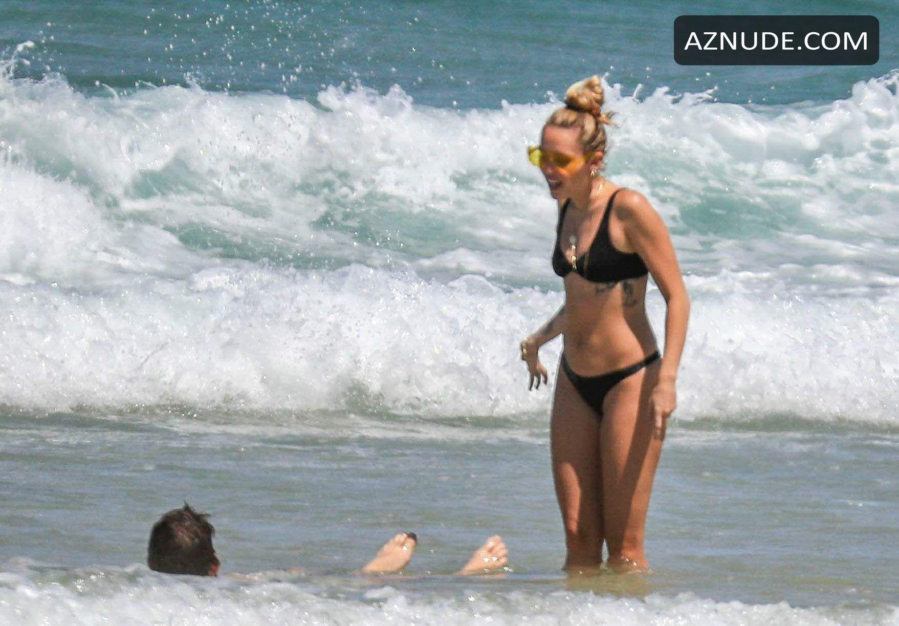 Miley Cyrus Wears A Black Bikini At The Beach In Byron Bay