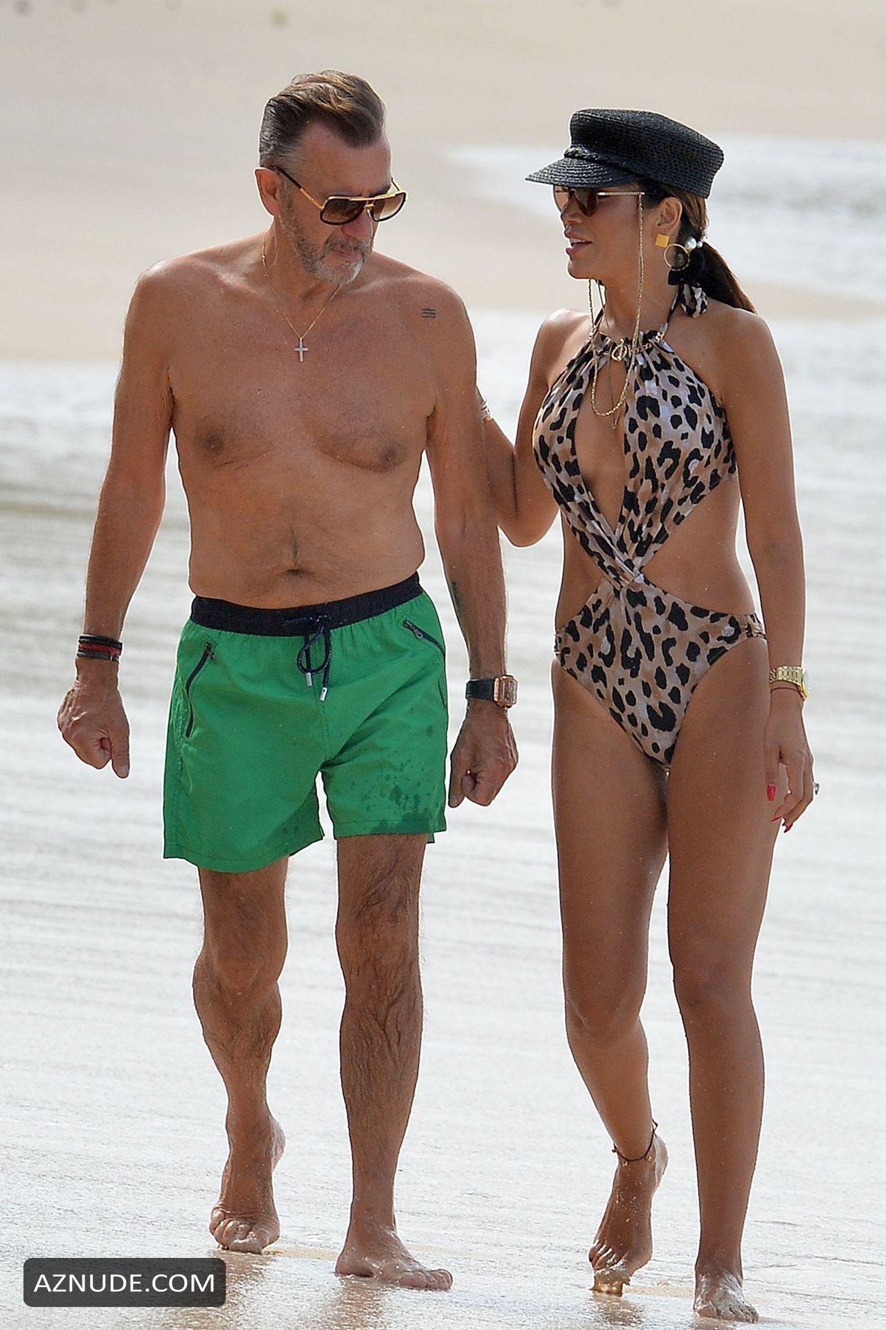 Duncan Bannatyne And His Wife Nigora Bannatyne Make A Splash On The Beach And Have Some Fun In