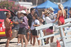  alt="Olivia Dunne Sexy in Olivia Dunne Sexy Shows Off Her Sizzling Body In A Spicy Red Swimsuit While Filming The Baywatch Reboot In La"