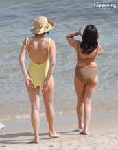 Gemma ArtertonSexy in Gemma Arterton Stuns In A Sexy Yellow Swimsuit At Exclusive Beach Party In Italy