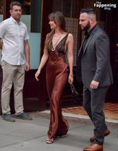 Dakota JohnsonSexy in Dakota Johnson Sexy Dazzles In A Hot Copper Silk Gown As She Leaves A Hotel In New York City