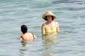 Gemma ArtertonSexy in Gemma Arterton Stuns In A Sexy Yellow Swimsuit At Exclusive Beach Party In Italy