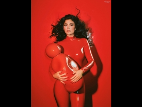  alt="Kylie Jenner Sexy in Kylie Jenner Sexy Poses Her Hot Assets In A Spicy Red Latex Dress For Her New Perfume Photoshoot"