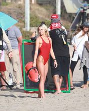  alt="Olivia Dunne Sexy in Olivia Dunne Sexy Shows Off Her Sizzling Body In A Spicy Red Swimsuit While Filming The Baywatch Reboot In La"