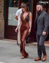 Dakota JohnsonSexy in Dakota Johnson Sexy Dazzles In A Hot Copper Silk Gown As She Leaves A Hotel In New York City