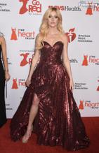 Katherine McNamaraSexy in Katherine Mcnamara Shines In A Sexy Fiery Red Dress At Aha's Red Dress Collection Concert