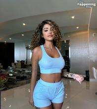 Malu TrevejoSexy in Malu Trevejo Sexy Flashes Her Pierced Boobs And Amazing Curves