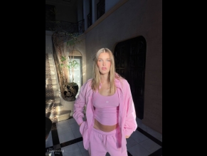  alt="Joy Corrigan Sexy in Joy Corrigan Sexy Shows Off Her Sultry Pokies And Abs In Pink Outfit"