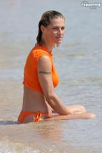 Aurora RamazzottiSexy in Aurora Ramazzotti and Michelle Hunziker Sizzles In Sexy See Through Orange Top In Sardinia