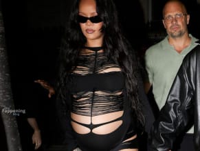Rihanna Sexy in Rihanna Sexy Seen With A$Ap Rocky Wearing A Sultry Black Dress While Leaving L'Arc Nightclub In Paris