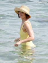 Gemma ArtertonSexy in Gemma Arterton Stuns In A Sexy Yellow Swimsuit At Exclusive Beach Party In Italy