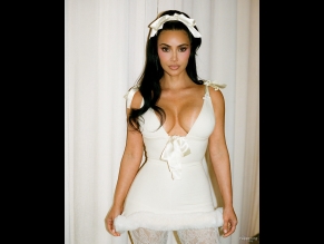 Kim Kardashian Sexy Shows Off Her Hot Assets In A Christmas Event