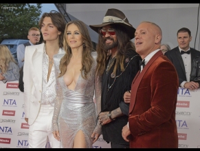 Elizabeth Hurley Sexy Shows Off Her Hot Boobs At The 30th National Television Awards In London