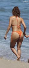 EVALONGORIASEXYSPOTTEDSHOWINGOFFHERHOTBODYWEARINGASIZZLINGORANGEBIKINIATMARBELLABEACHINSPAIN - NUDE STORY