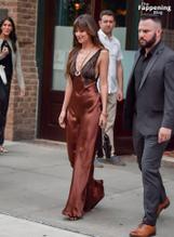 Dakota JohnsonSexy in Dakota Johnson Sexy Dazzles In A Hot Copper Silk Gown As She Leaves A Hotel In New York City