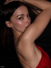  alt="Dove Cameron Sexy in Dove Cameron Sexy Shows Off Her Hot Cleavage And Legs In A Spicy Red Dress For Diesel's Fragrance Campaign Photoshoot"