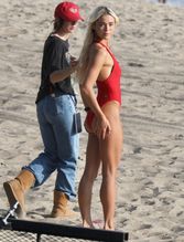  alt="Olivia Dunne Sexy in Olivia Dunne Sexy Shows Off Her Sizzling Body In A Spicy Red Swimsuit While Filming The Baywatch Reboot In La"