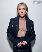 Emma RobertsSexy in Emma Roberts Sizzles In Sexy See Through Top At Khaite Fashion Show In Nyc