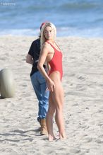  alt="Olivia Dunne Sexy in Olivia Dunne Sexy Shows Off Her Sizzling Body In A Spicy Red Swimsuit While Filming The Baywatch Reboot In La"