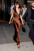 Dakota JohnsonSexy in Dakota Johnson Sexy Dazzles In A Hot Copper Silk Gown As She Leaves A Hotel In New York City