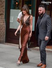 Dakota JohnsonSexy in Dakota Johnson Sexy Dazzles In A Hot Copper Silk Gown As She Leaves A Hotel In New York City