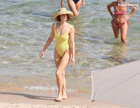 Gemma ArtertonSexy in Gemma Arterton Stuns In A Sexy Yellow Swimsuit At Exclusive Beach Party In Italy