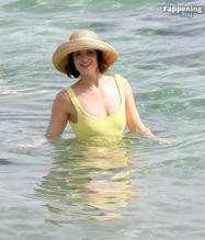 Gemma ArtertonSexy in Gemma Arterton Stuns In A Sexy Yellow Swimsuit At Exclusive Beach Party In Italy