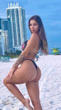 ROMINAMALASPINASHOWSOFFHERSEXYBOOTYANDTITSINABLACKBIKINI - NUDE STORY