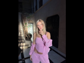  alt="Joy Corrigan Sexy in Joy Corrigan Sexy Shows Off Her Sultry Pokies And Abs In Pink Outfit"
