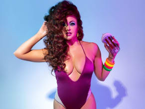 Maria Kanellis Sexy Photo Showing Off Her Hot Boobs As She Poses In A Sultry Purple Bodysuit