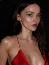  alt="Dove Cameron Sexy in Dove Cameron Sexy Shows Off Her Hot Cleavage And Legs In A Spicy Red Dress For Diesel's Fragrance Campaign Photoshoot"