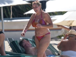 CLAIRESWEENEYSEXYSPOTTEDSHOWINGOFFHERSIZZLINGBIKINIBODYINBARBADOSBEACH - NUDE STORY