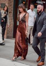 Dakota JohnsonSexy in Dakota Johnson Sexy Dazzles In A Hot Copper Silk Gown As She Leaves A Hotel In New York City