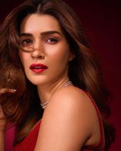 Kriti Sanon In A Red Maxi Dress Featuring A High slit At Filmfare Awards 2022