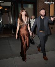 Dakota JohnsonSexy in Dakota Johnson Sexy Dazzles In A Hot Copper Silk Gown As She Leaves A Hotel In New York City