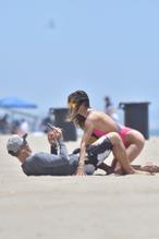 Alessandra AmbrosioSexy in Alessandra Ambrosio Sexy Enjoys Another Weekend of Beach Volleyball With Friends Wearing A Pink One-Piece Swimsuit