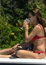 Alessandra AmbrosioSexy in Alessandra Ambrosio parades her sexy model curves in a red bikini while onboard a yacht with family and friends