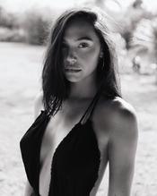 Alexis RenSexy in Alexis Ren shows off her natural body posing topless, in a low-cut black dress