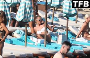 Alina Baikova Sexy in Alina Baikova Sexy Seen Showing Off Her Hot Figure Wearing A White Bikini At The Beach in Greece