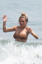 Amber DaviesSexy in Amber Davies showcases her bikini body on the beach in Marbella, Spain