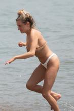 Amber DaviesSexy in Amber Davies showcases her bikini body on the beach in Marbella, Spain